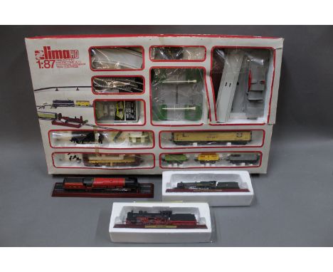A Lima HO scale electric train set, and three collectable model locomotives