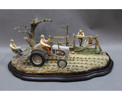 A Country Artist's limited edition (10 of 450) sculpture group, entitled "Lightly does it!", depicting two men on a Ferguson 
