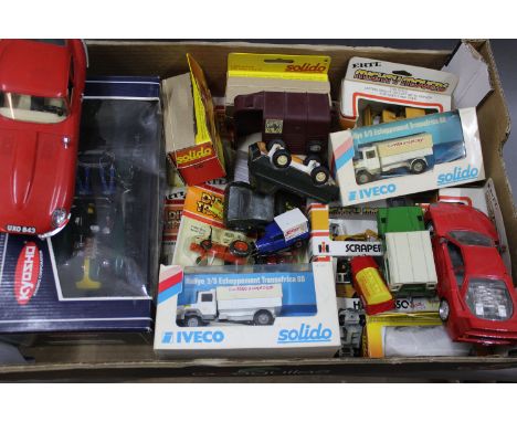 A collection of boxed and unboxed diecast model vehicles to include Tonka, Ertl, Solido and others