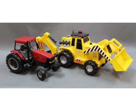 An Ertl 1/16 scale diecast model tractor MX110, and a plastic Tonka 'Mighty Motorised' 3649 digger