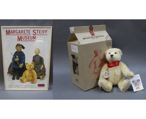 A framed Margarete Steiff museum print, measuring 86cm high x 61.5cm wide, together with a boxed Steiff "100 years of Steiff"