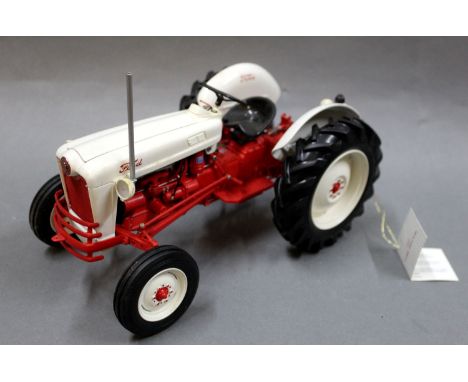 A Franklin Mint 1953 Ford Jubilee tractor, in white/red, 1/12th scale