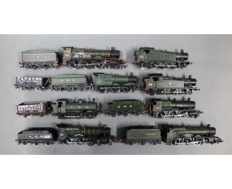 A group of 7 Bachmann 00 gauge locomotives, tenders, and rolling stock 