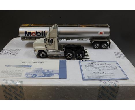 A Franklin Mint 1:43 scale Mack CH600 tractor with replica 8-wheel  40ft oil tanker 