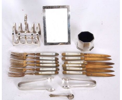 Mixed Lot:  A small rectangular silver photograph frame, easel backed, Birmingham 1912 (a/f), a George V silver salt and line