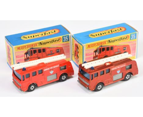 Matchbox Superfast 35a Merryweather Marquis Fire Engine pair (1) metallic red body, blue windows and roof lights, grey base, 