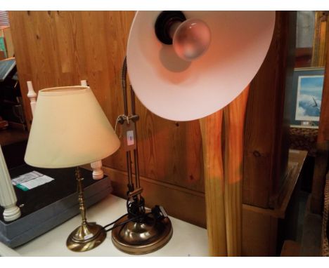 A brushed brass adjustable table lamp together with a baluster shaped brass table lamp