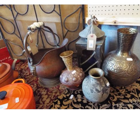 A wrought iron and wirework spark guard together with a copper coal bin, copper lantern etc
