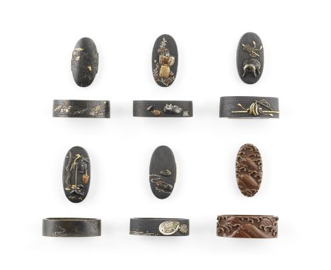 Six fuchi-gashira (hilt collars and pommels)Edo period (1615-1868), 18th to 19th centuryThree of shakudo nanako, one of shibu