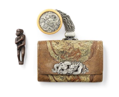 A tabako-ire (tobacco pouch) with kagamibuta netsuke and a wood netsukeThe netsuke attributed to Tanaka Minko, both Edo perio