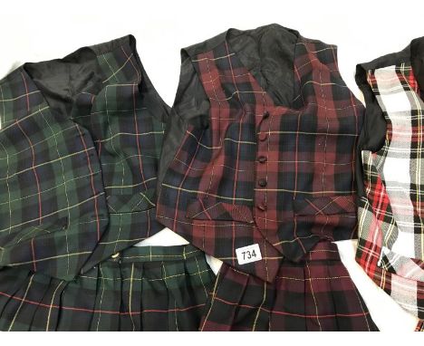 Three sets of Tartan skirts with matching waistcoats size 14 / M