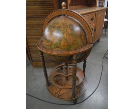 A vintage globe drinks cabinet. COLLECT ONLY.