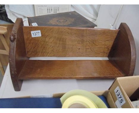 An oak Mouseman book shelf.