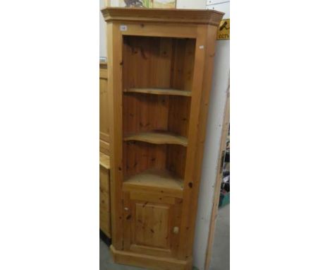 A single door pine corner cabinet with open shelf top. 190H x 70W x 44D. COLLECT ONLY.