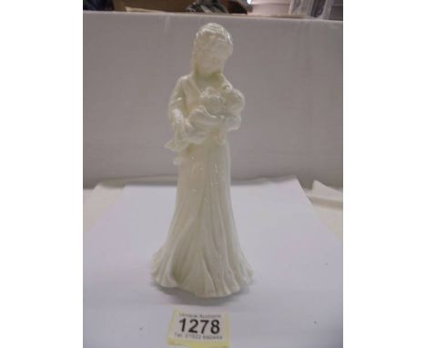 A Royal Worcester figurine 'Sweet Dreams' of mother and child by Maureen Halson 1988.