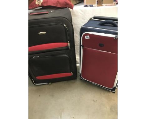 2 suitcases 1 large and 1 light weight.