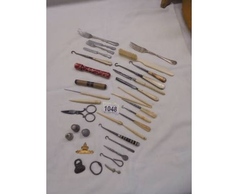 A mixed lot of sewing and manicure tools.