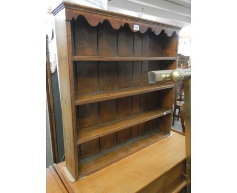 A dark stained wall shelf with plate grooves, COLLECT ONLY.