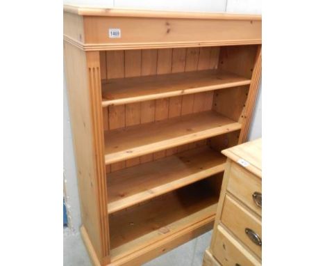 A 20C pine four shelf bookcase with adjustable shelves, 122 cm tall, 90 cm wide, 34 cm deep, COLLECT ONLY.