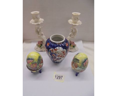 Two Old Tupton ware egg trinket boxes, a pair of candlesticks and an oriental vase.