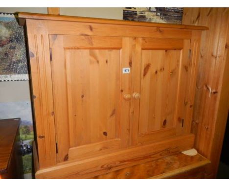 A small pine cupboard with adjustable shelf, 76H x 96W x 32D. COLLECT ONLY.