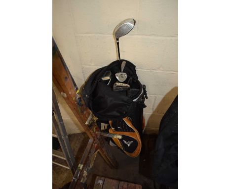A Palm Springs golf caddy and a quantity of clubs
