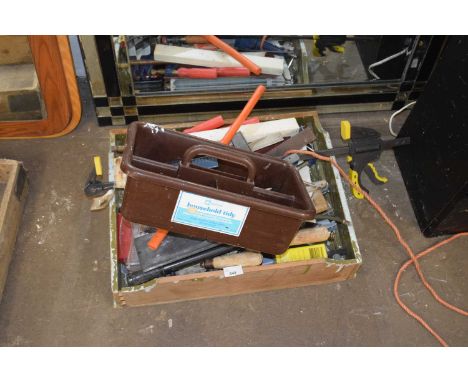 An assortment of wood working tools, clamps, squares etc