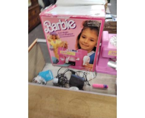 A hard shell coin collections suitcase / case together with boxed 1988 Barbie knit magic children's sewing machine etc