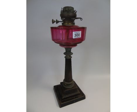 VICTORIAN OIL LAMP WITH CRANBERRY GLASS RESERVOIR