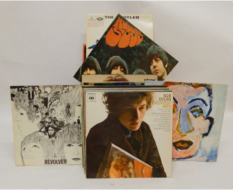 A box of vinyl LP records with the Beatles, Bob Dylan, Louis Armstrong etc Condition Report: Available upon request