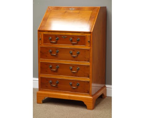 Yew wood fall front bureau, four graduating drawers, bracket feet, W58cm, H97cm, D47cm Condition Report Click here for furthe