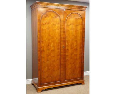 Yew wood double wardrobe, interior hanging space and shelf, W129cm, H200cm, D60cm   Condition Report   Click here for further