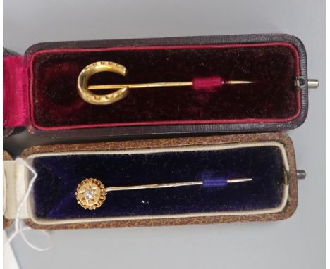 Gold diamond set stick pin together with equestrian themed gold stick pinÿ 