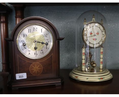 Mantle clock together with a glass cased clock 