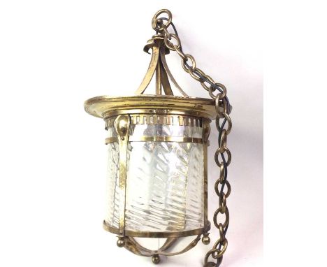PAIR OF ARTS & CRAFTS BRASS AND GLASS HALL LANTERNS, LATE 19TH / EARLY 20TH CENTURY each with chain suspension, over four spl