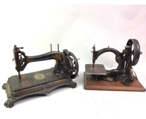 TWO SEWING MACHINES, LATE 19TH / EARLY 20TH CENTURY the first by Wilcox &amp; Gibbs sewing machine Co of New York, the second