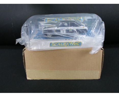 Cased Scalextric C4291 Ford Escort mkII 1982 Manx Rally Ari Vatenen slot car, with outer trade box