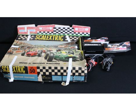 Two boxed Scalextric slot cars with lights to include C288 Porsche with silver lights and C289 Gold Porsche, plus a boxed Sca