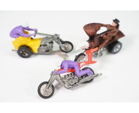 Three Mattel Hot Wheels RRRumblers models to include Bold Eagle in brown with brown rider, Choppin' Chariot in yellow with pu