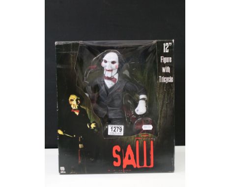 Boxed Neca Reel Toys Saw 12" figure with tricycle, complete and ex