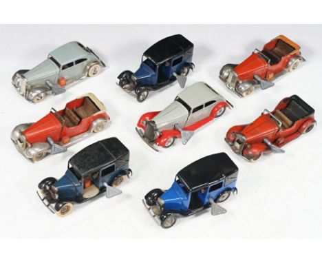Eight Triang Minic Post War tinplate and clockwork models to include 3 x Taxi 35M in dark blue with black roof, 29M Traffic C