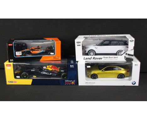 Four boxed r/c cars to include 2 x Rastar (1/18 McLaren F1 MCL36 &amp; 1/12 94700 F1 Redbull), CMJ 1/14 Land Rover Range Rove