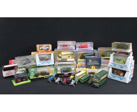 32 Boxed diecast models to include Corgi, ERTL, Classix, Burago, Lledo Only Fools and Horses Solido and Matchbox The Dinky Co