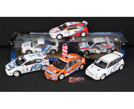 Six 1/18 diecast rally cars to include 2 x boxed Ricko (Ford RS2000 Rally &amp; Lancia Delta HF), 3 x AutoArt Ford Focus (all