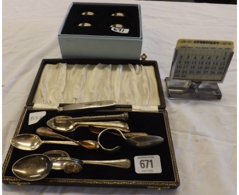 FOUR STAINLESS STEEL NAPKIN RING IN BOX, A COMB AND A CASE WITH VARIOUS PLATED ITEMS