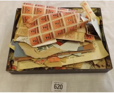 A TIN OF VINTAGE POSTAGE STAMPS INCLUDING VINTAGE GERMAN STAMPS