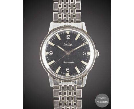 A GENTLEMAN'S STAINLESS STEEL OMEGA SEAMASTER AUTOMATIC BRACELET WATCH
CIRCA 1967, REF. 165.002 WITH BLACK MILITARY TYPE LUMI
