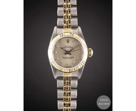 A LADIES STEEL &amp; GOLD ROLEX OYSTER PERPETUAL BRACELET WATCH
CIRCA 1988, REF. 67193 WITH ORIGINAL DIAMOND SET SILVER DIAL
