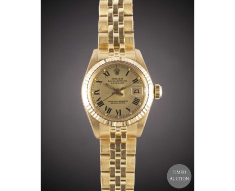 A LADIES 18K SOLID GOLD ROLEX OYSTER PERPETUAL DATEJUST BRACELET WATCH
DATED 1979, REF. 6917 WITH CHAMPAGNE "BUCKLEY" DIAL, A