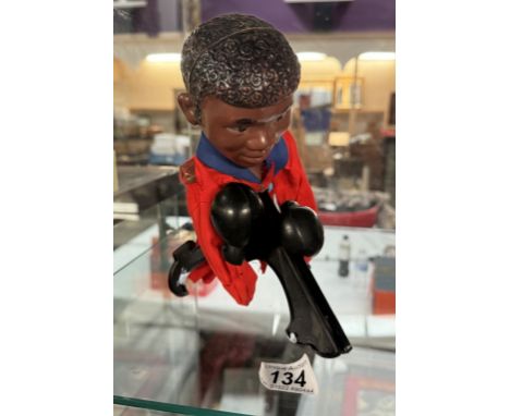 A vintage Muhammad Ali boxing glove puppet